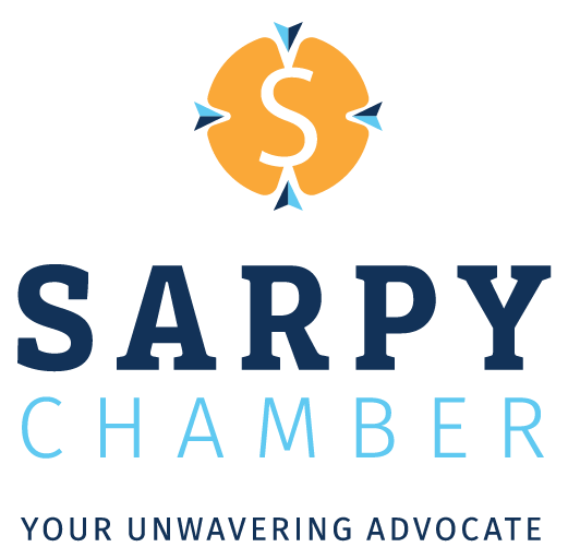 Logo featuring a stylized dollar sign with circular arrows and text "SARPY CHAMBER.