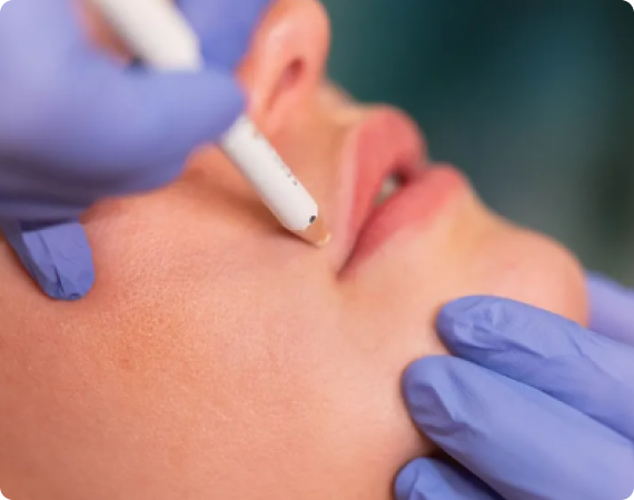 Medical professional administering an injection into a patient’s neck area.
